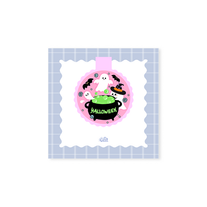 Ghost Cauldron holographic magnetic bookmark with bubbling green potion, white ghosts, a witch and black bats