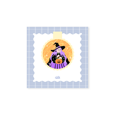 Purple Witch holographic magnetic bookmark with a purple-haired witch holding an orange jack-o'-lantern bucket