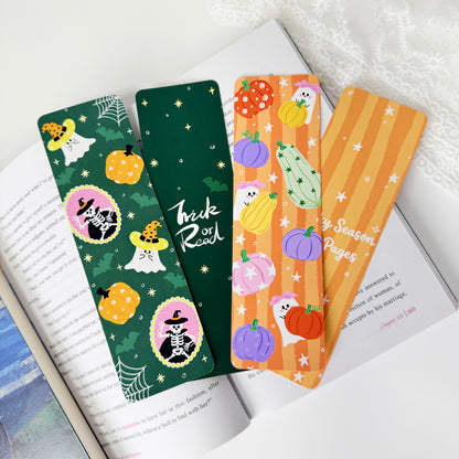 Two double-sided Halloween classic bookmarks with Trick or Read and Spooky Season Cozy Pages designs