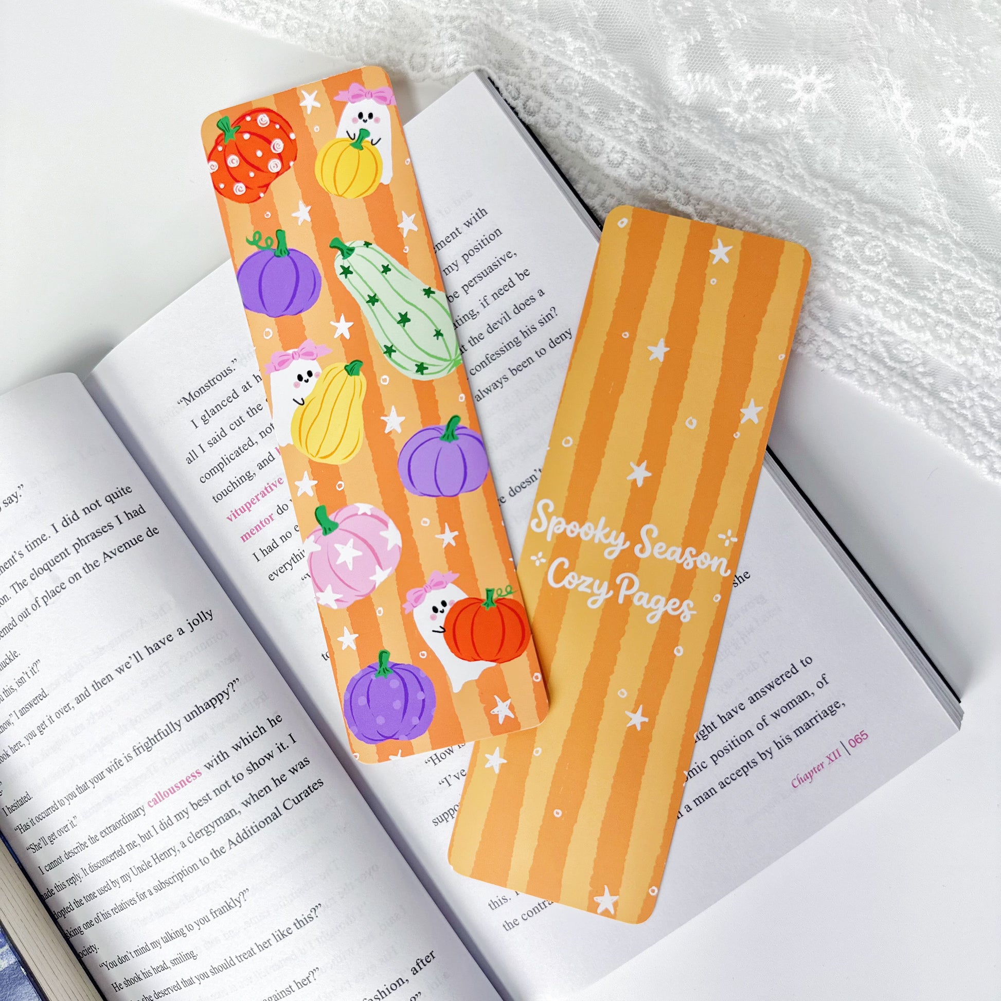 Spooky Season Cozy Pages double-sided classic bookmark showing the illustrated front and quote back
