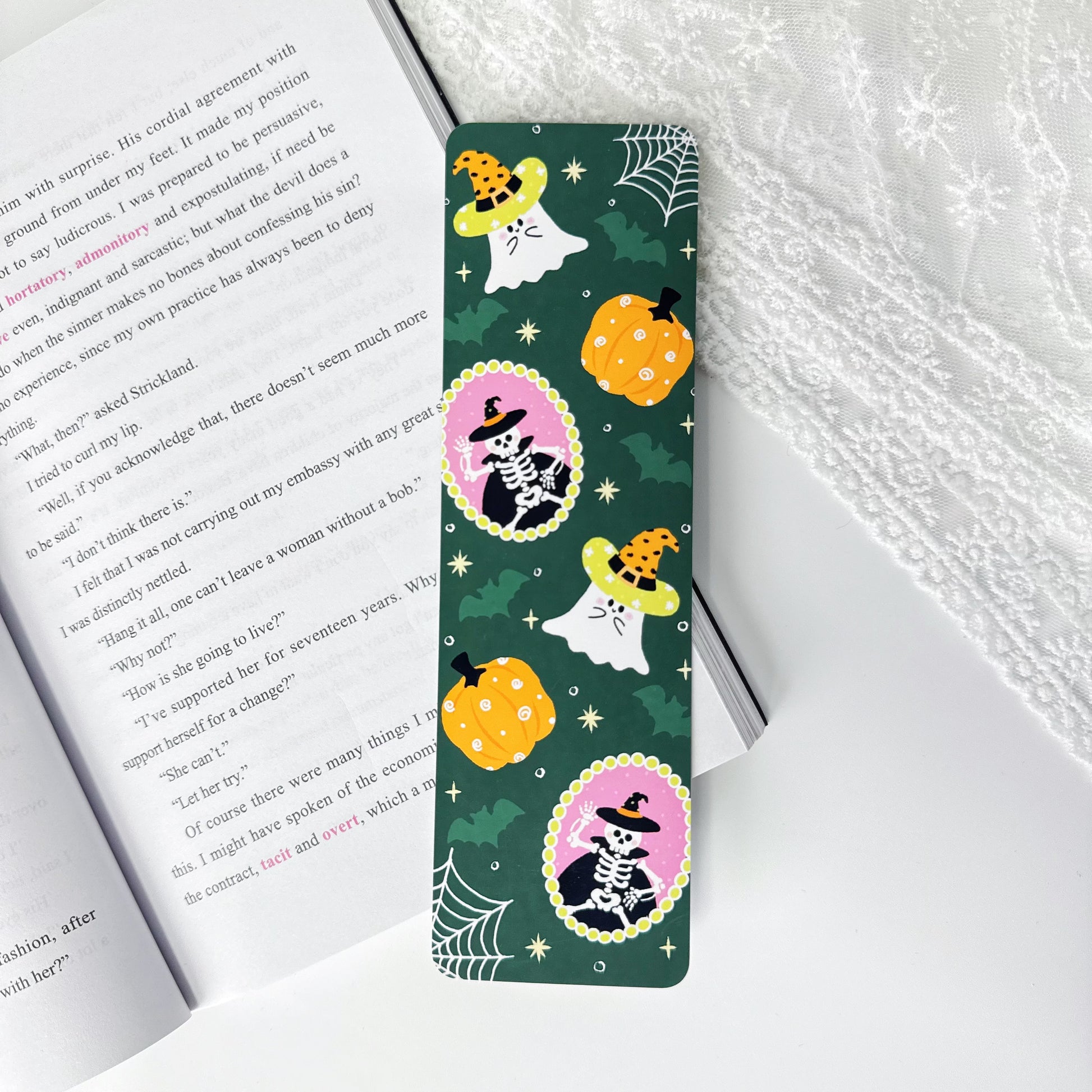 Trick or Read Halloween classic bookmark with ghosts, pumpkins and skeletons on dark green