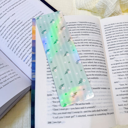 Green mint stripe bookmark displayed on an open book page