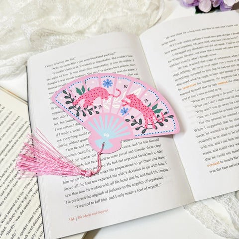 Pink leopard fan tassel bookmark displayed with tassel detail