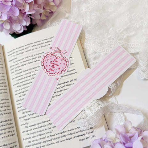 Heart shaped bookmark displayed on an open book page
