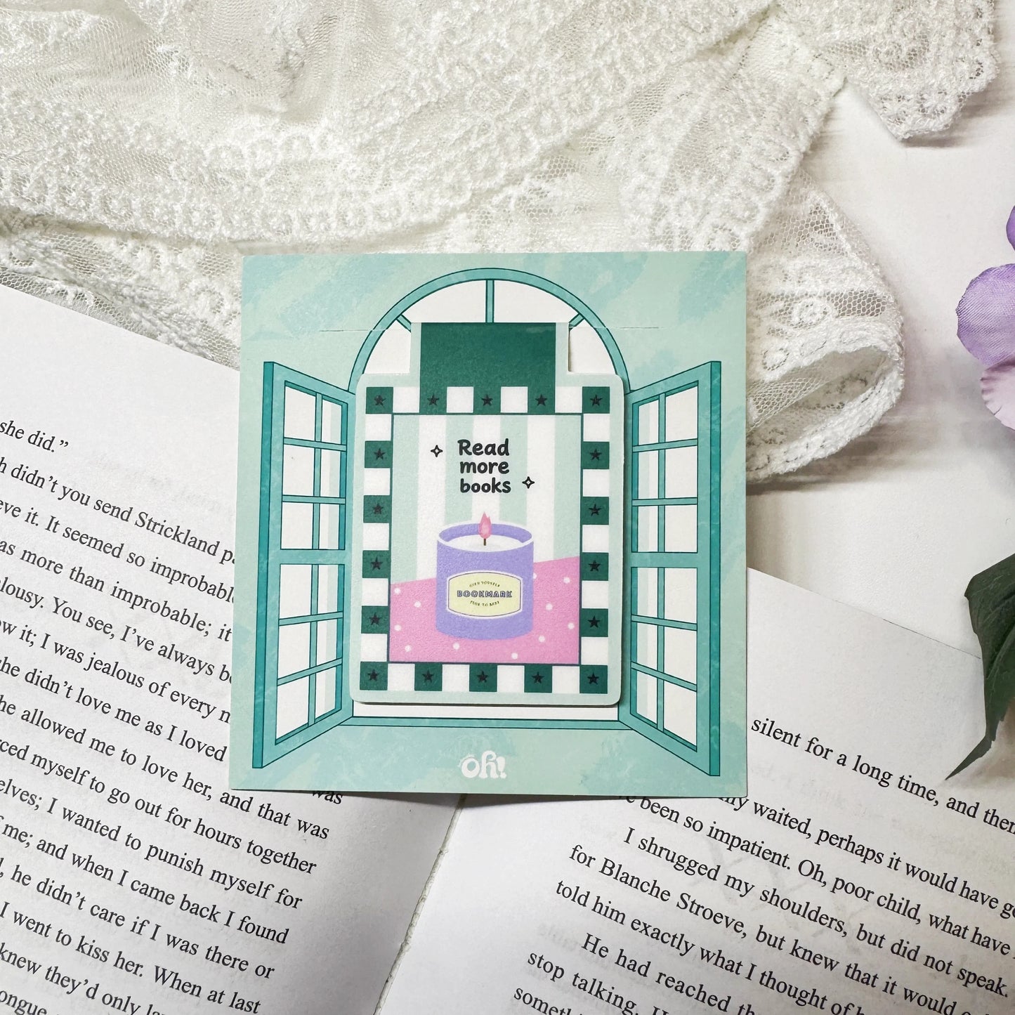 Read More Books magnetic bookmark clipped on a book page