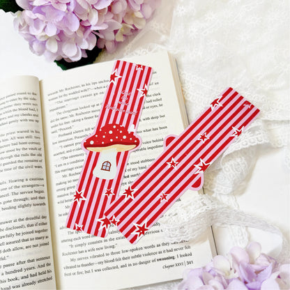 Mushroom house shaped bookmark displayed on an open book page