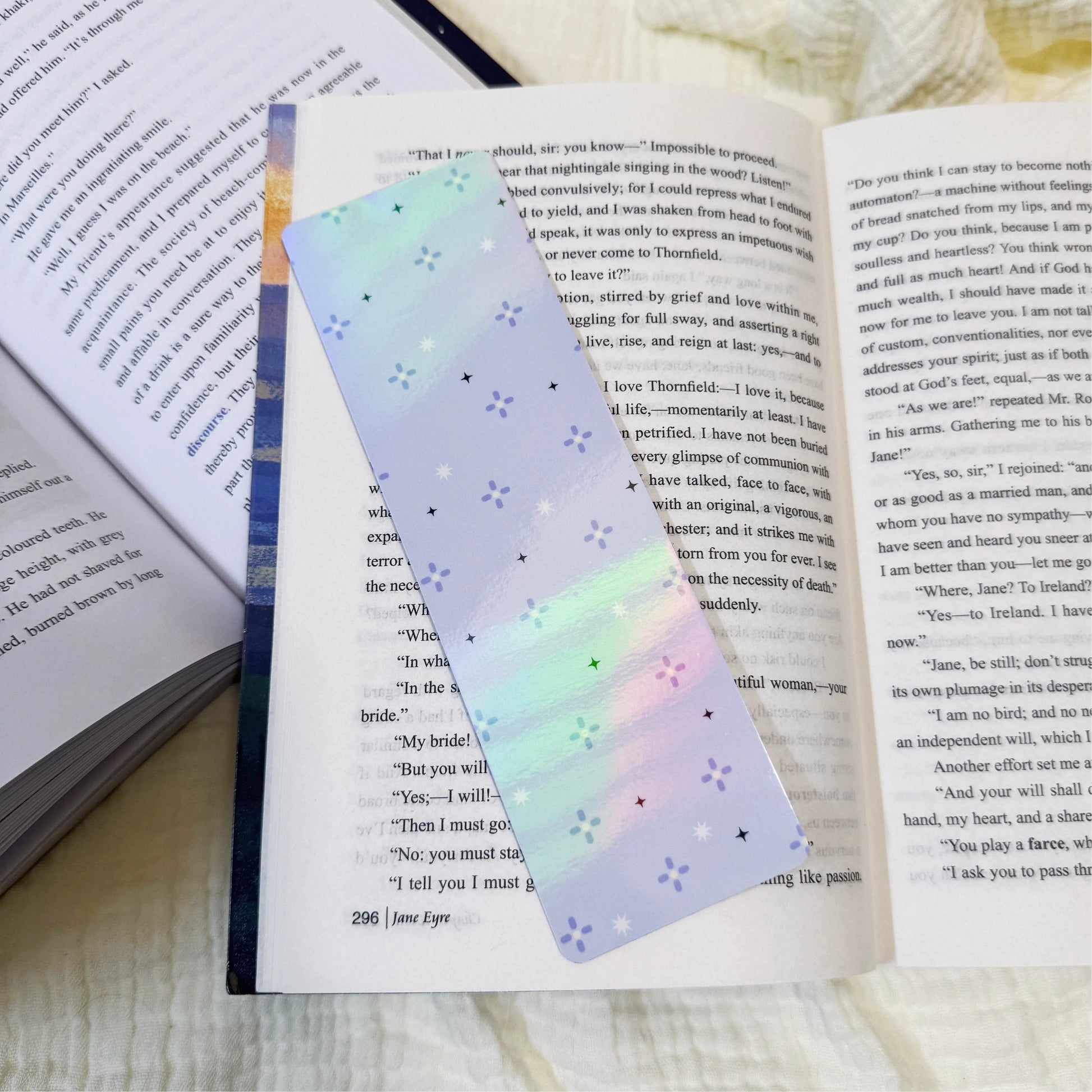 Lavender star scatter bookmark displayed on an open book page