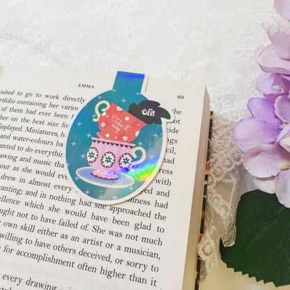 Oh Take It Easy teacup magnetic bookmark displayed on an open book