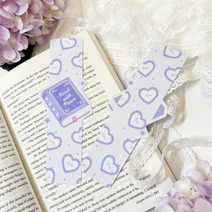 Lavender heart bookmark displayed on an open book page