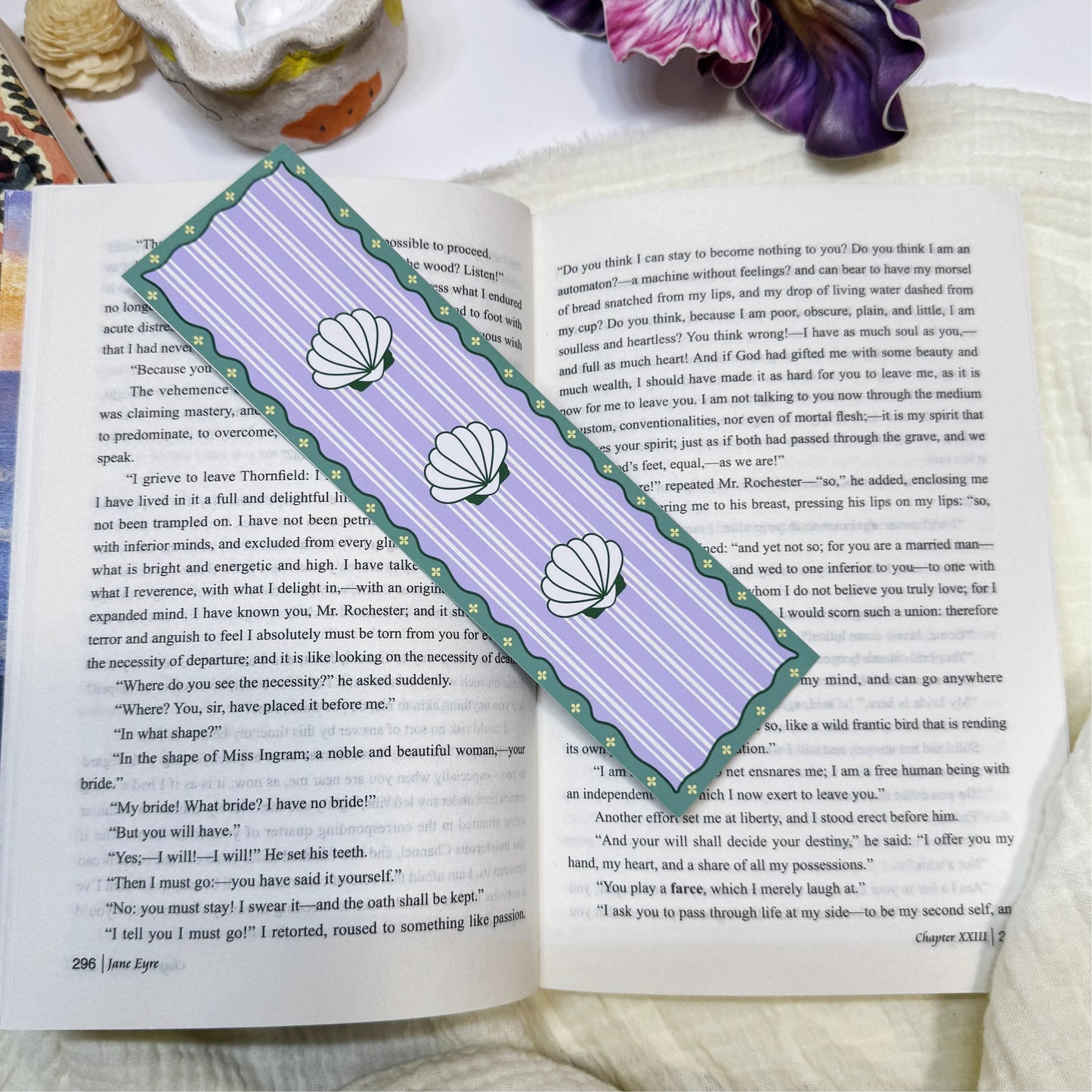 Purple shell stripe classic bookmark displayed on an open book page