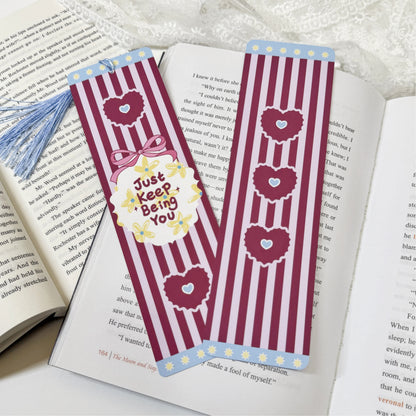 Just Keep Being You tassel bookmark displayed with coordinating tassel