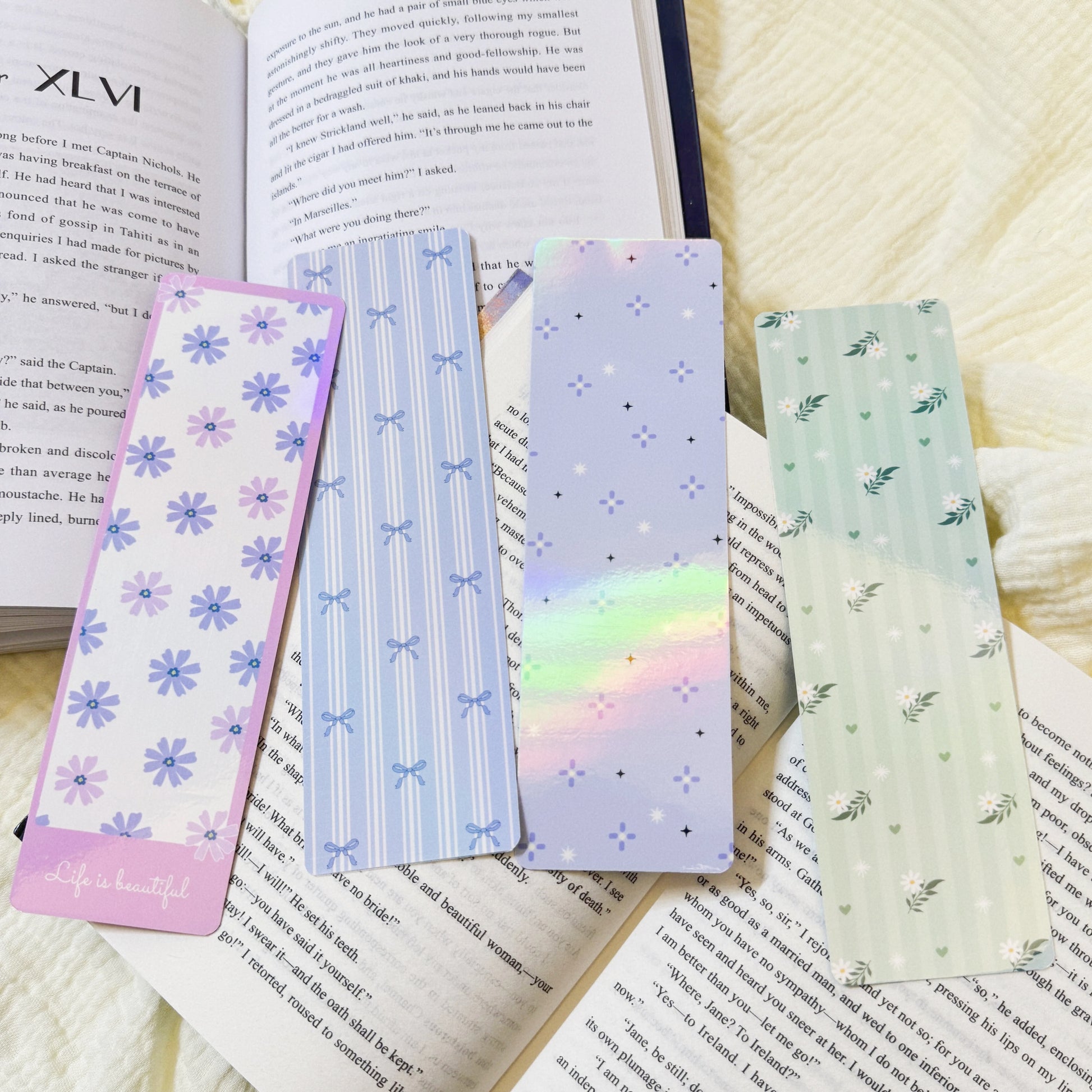 Holographic classic bookmark displayed on an open book page