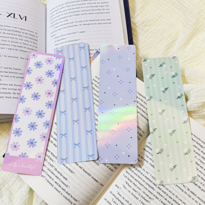Holographic classic bookmark displayed on an open book page
