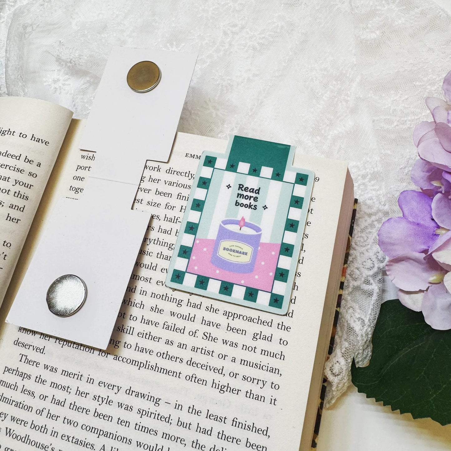 Magnetic bookmark clipped onto an open book page